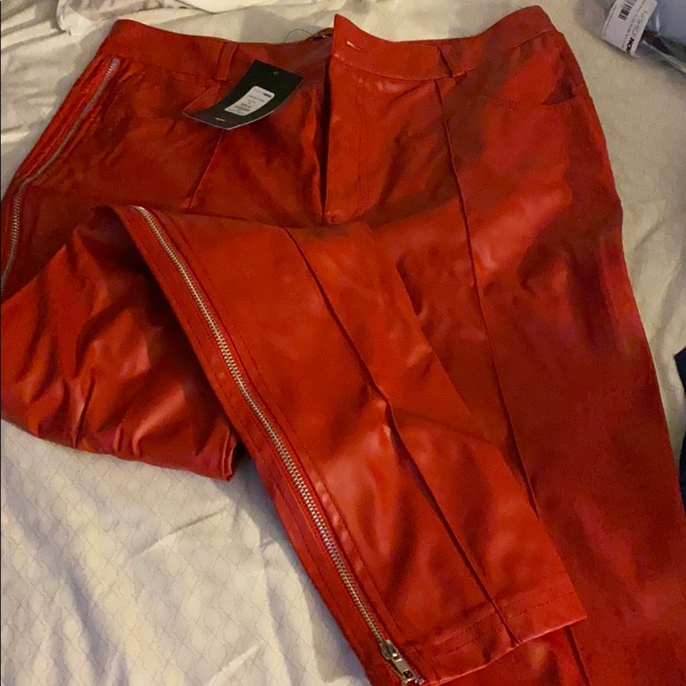 Faux leather pant with zipper along each side
